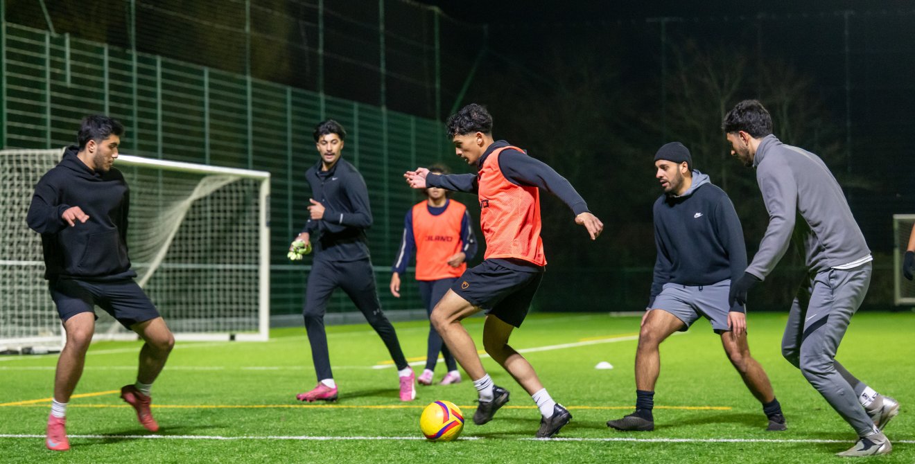 Club members playing football