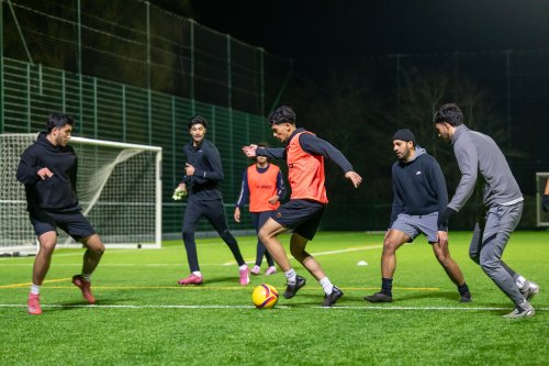 Club members playing football