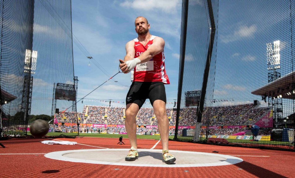 Osian mid swing in the hammer throw at the Commonwealth Games 2022