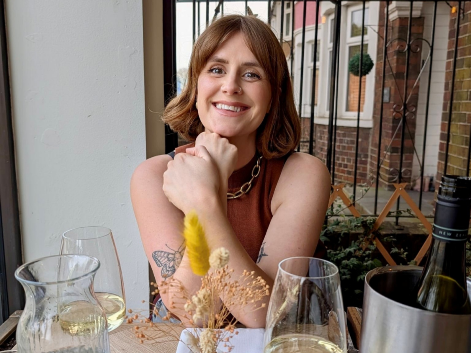 Rosie sat at a restaurant table.