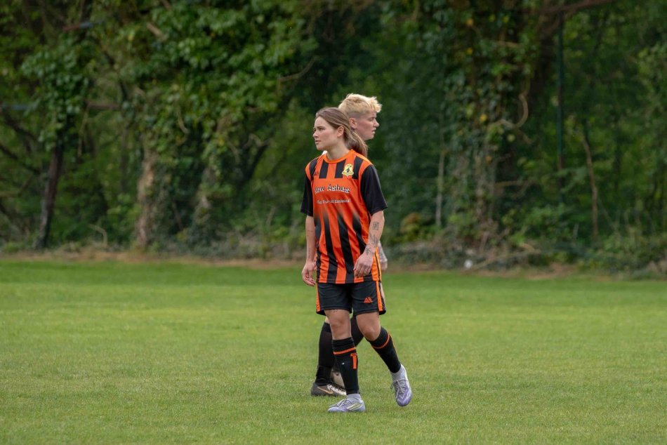 Sophie Ambler playing football.