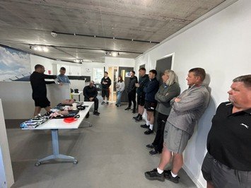The Operations team assemble for first aid training.