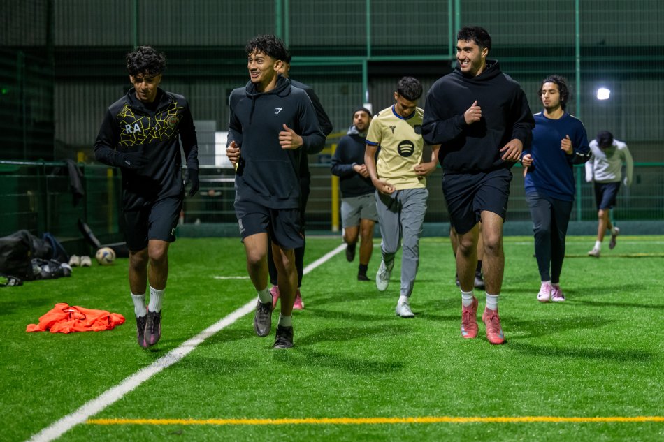 Club members warm up at training