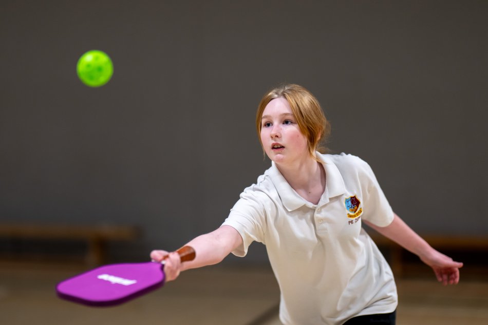 A Heolddu Comprehensive School pupil plays padel.